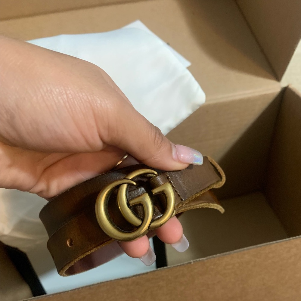 Brown Gucci belt